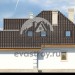 Проект европейского двухэтажного дома из керамоблоков с гаражом, эркером и камином