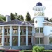 Проект узкого трехэтажного дома из кирпича в стиле барокко с цокольным этажом и тренажёрным залом, с площадью до 650 кв м