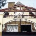 Проект углового трёхэтажного дома из кирпича в стиле барокко с мансардным этажом и двухместным гаражом, с площадью до 600 кв м